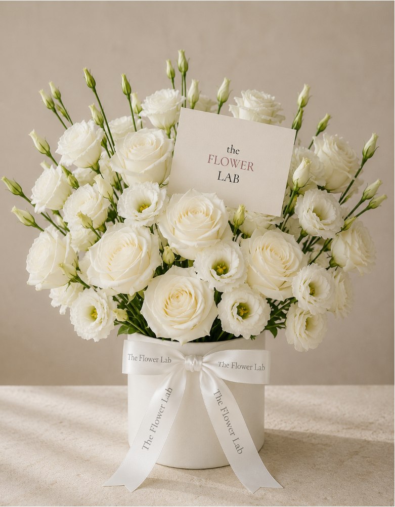 Still Garden — Rosas y lisianthus blancos — The Flower Lab